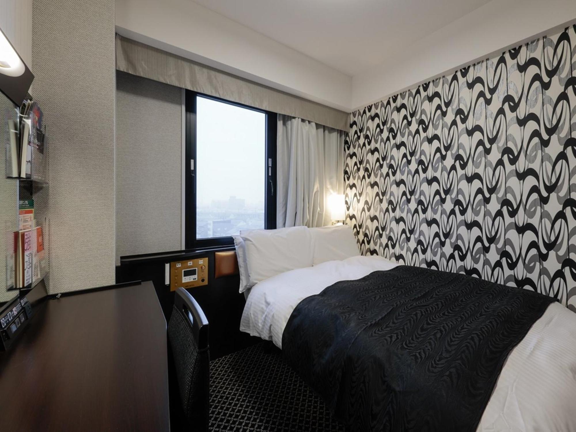 Apa Hotel Tonami Ekimae Buitenkant foto
