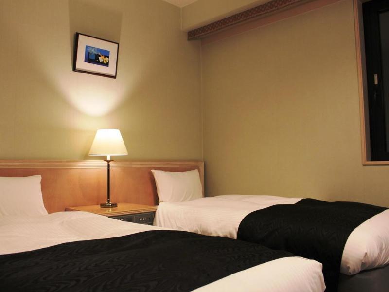 Apa Hotel Tonami Ekimae Buitenkant foto